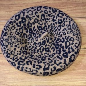 Women’s Berte  Leopard Print Hat color is light brown with Black.